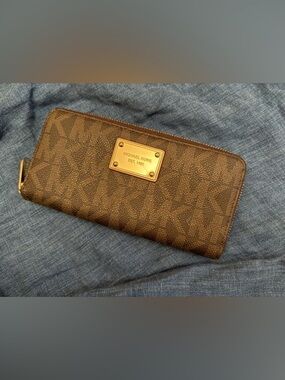 Michael Kors Signature Logo Print Zip Around Continental Wallet In Brown